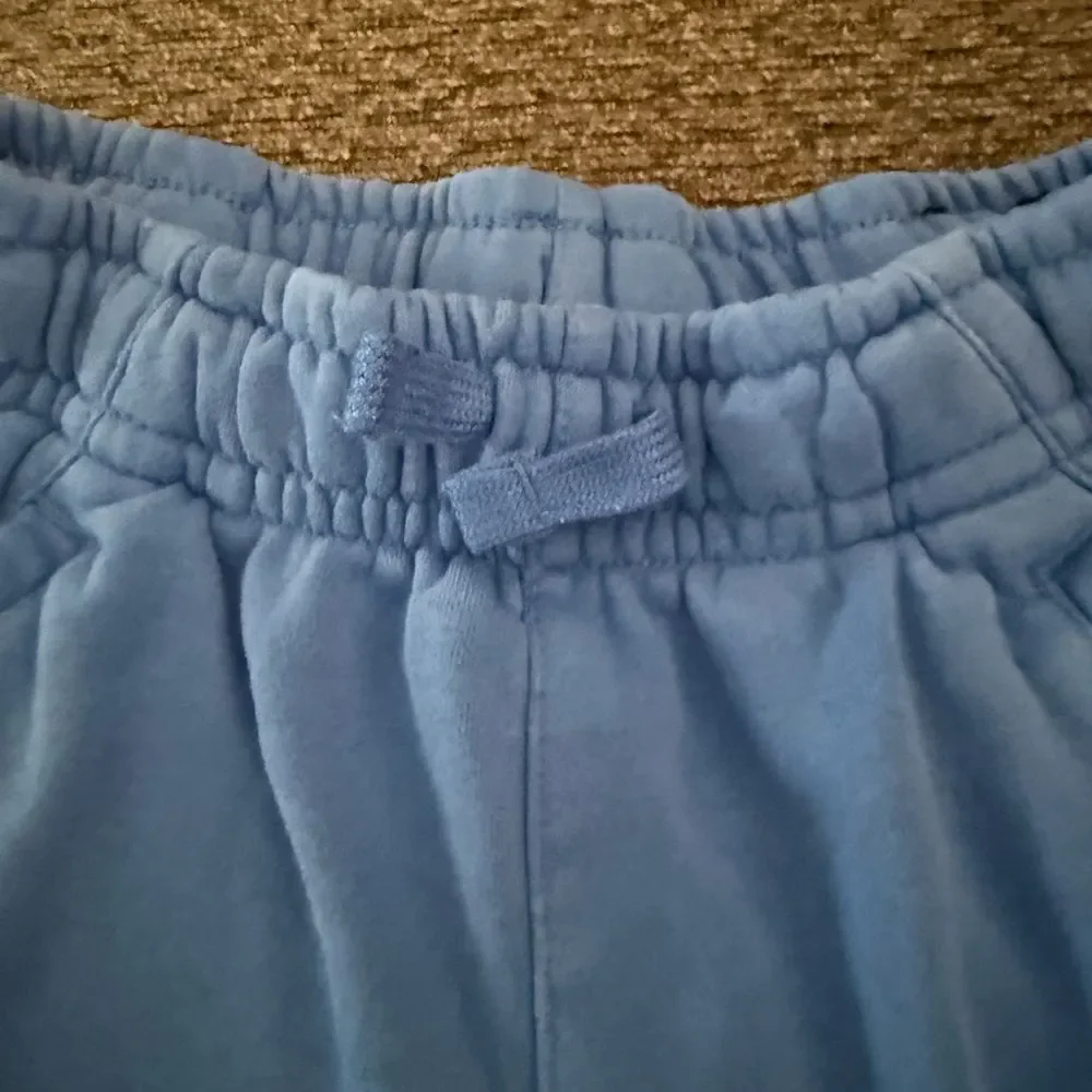 Nike Sportswear Club Fleece shorts royal blue with green Nike and black check